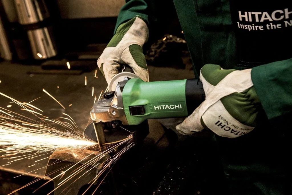 Person Operating Hitachi Angle Grinder